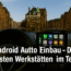 Innenansicht eines Autos mit Blick auf das CarPlay-Display und die Speicherstadt Hamburg im Hintergrund – Symbolbild für Android Auto und CarPlay Nachrüstung in Deutschland.